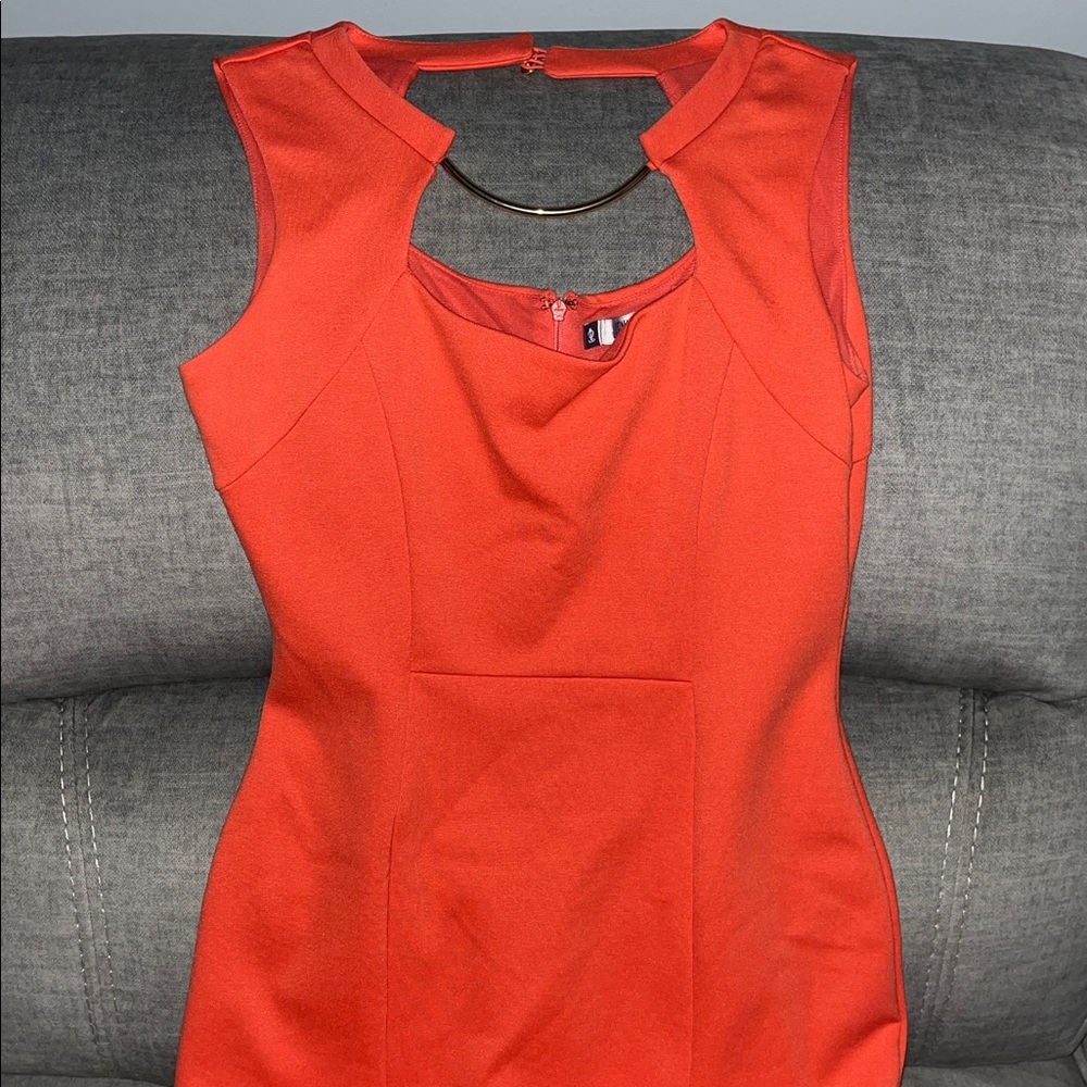 Jennifer Lopez Vibrant Orange Dress with Gold Detail